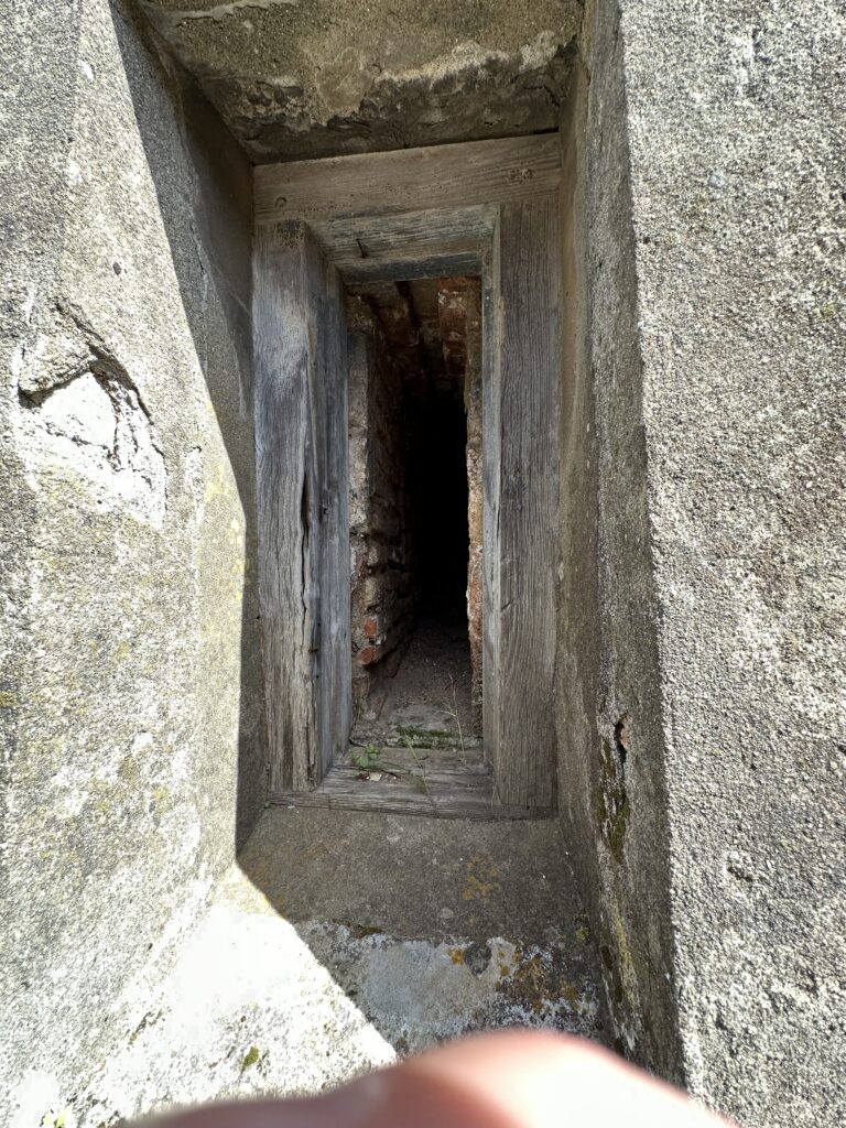 Narrow vertical stone shaft or passage inside the tunnels carved into the Rock of Gibraltar.