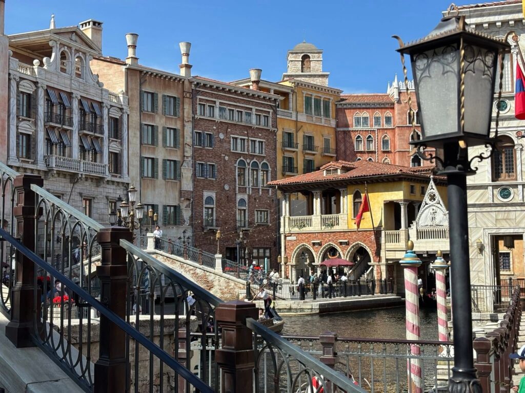 Tokyo DisneySea Mediterranean Harbor with canal, bridge, and colorful European-style buildings