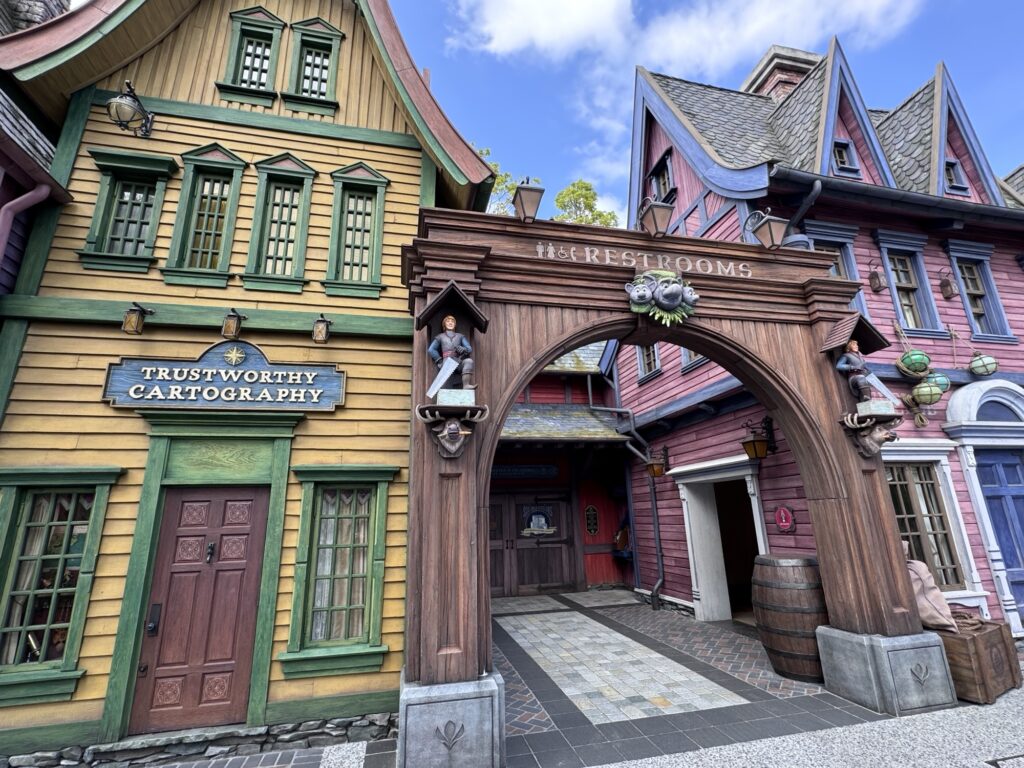 Colorful cartoon-style buildings and archway at Tokyo DisneySea with playful, exaggerated architecture