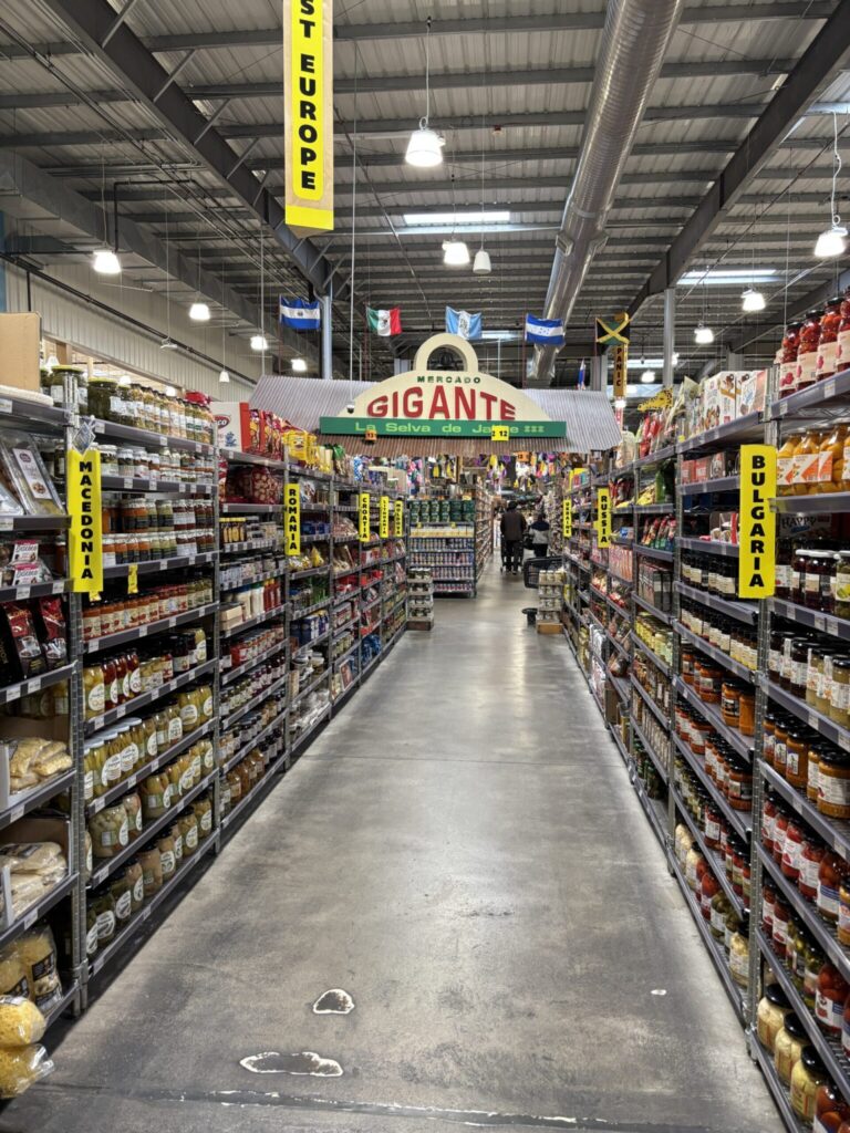 Jungle Jim international aisle with signs listing the different countries for all the foods. 