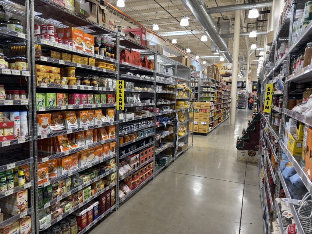 Racks of items available in Jungle Jims international aisle of Holland and Spain.