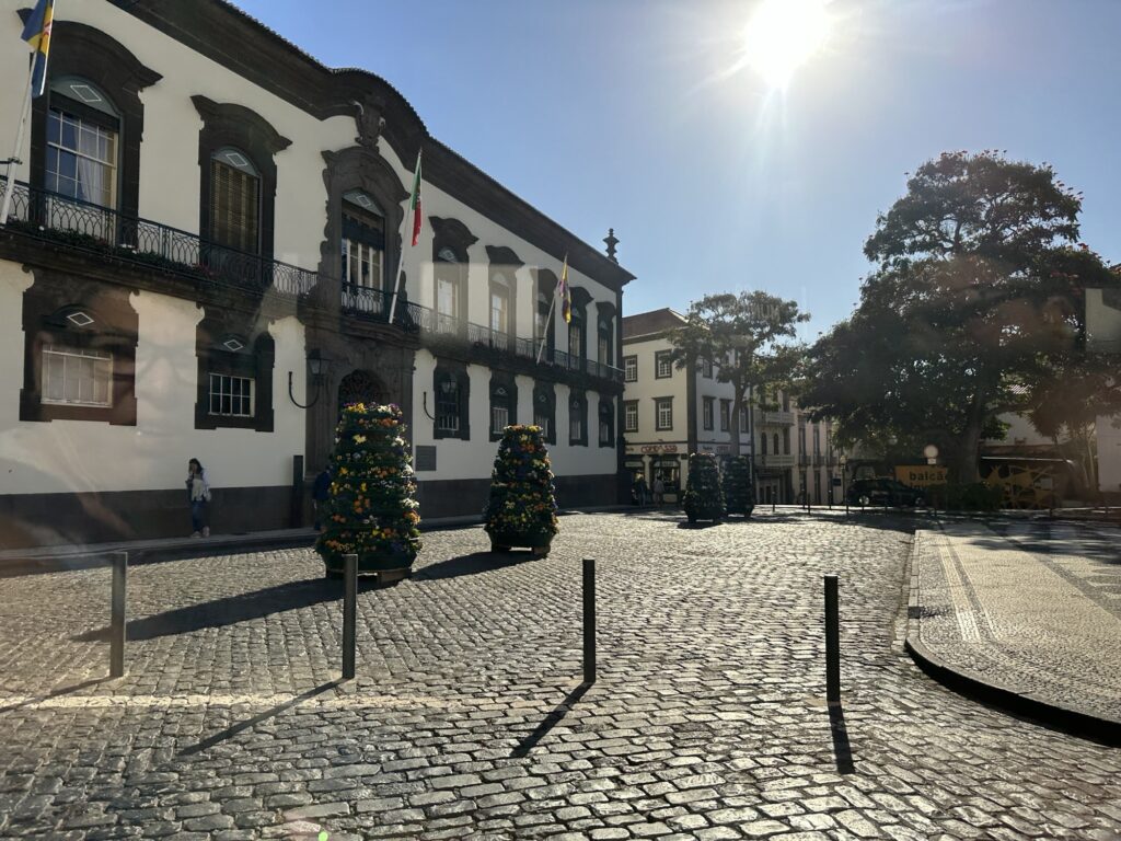 Historic square in Funchal Madeira with cobblestone streets and traditional Portuguese buildings